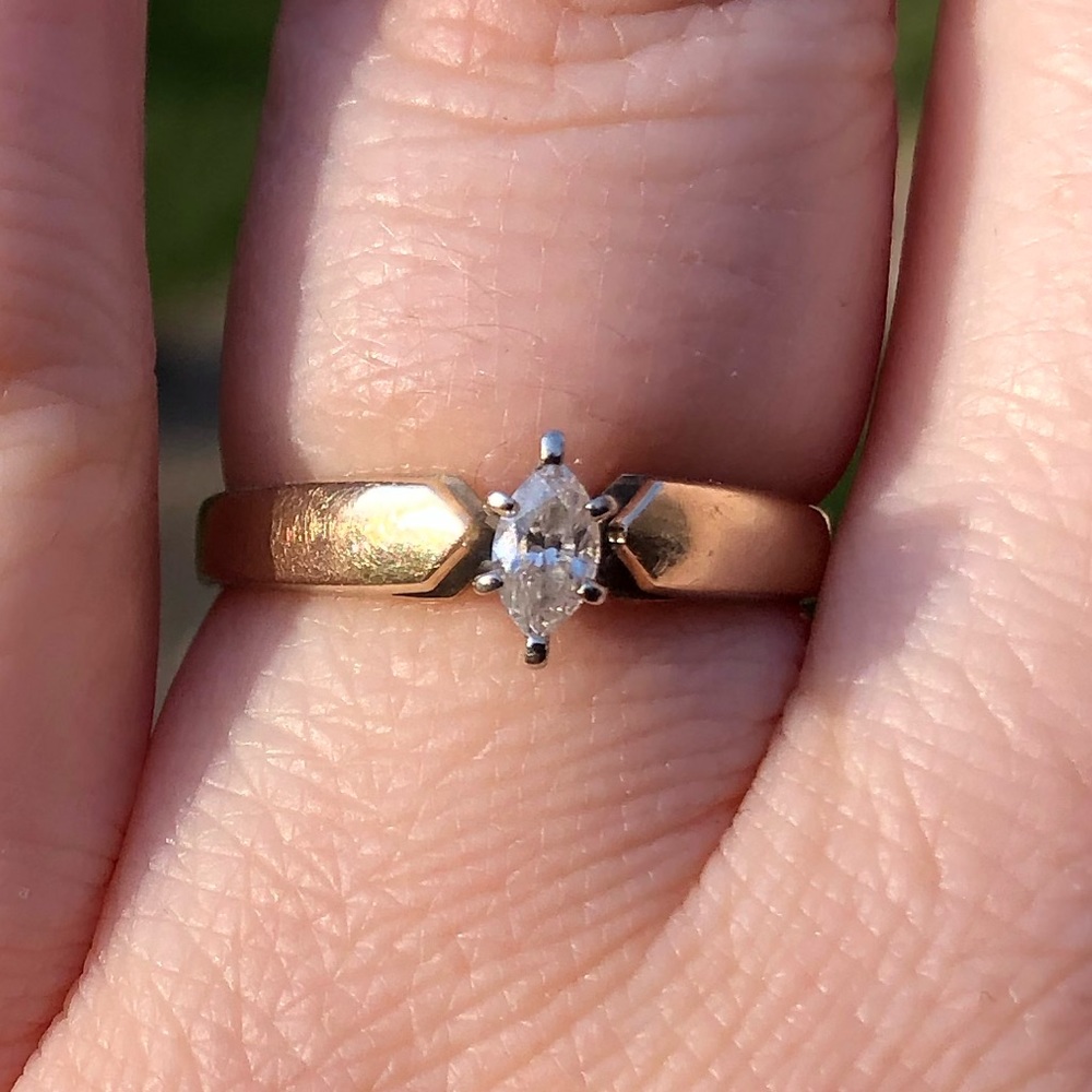 Genuine diamond and 10k yellow gold marquis ring